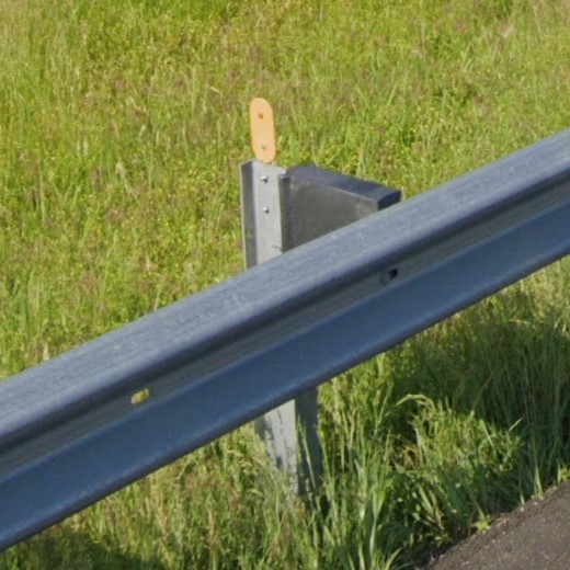 Yellow oval on guardrail