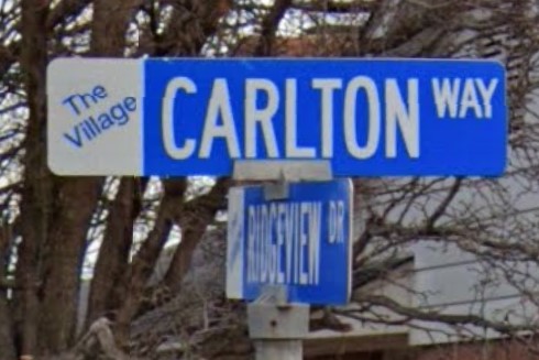 The Village, OK street sign