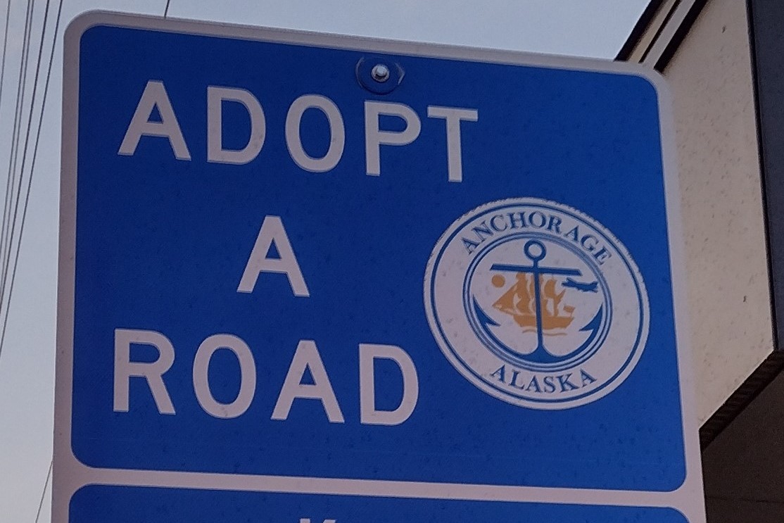 Anchor symbol on Adopt signs