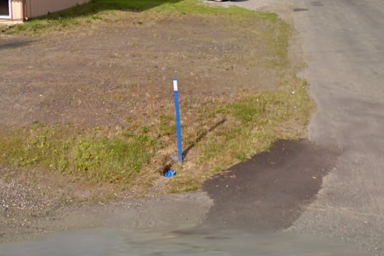 Blue bollards at intersections