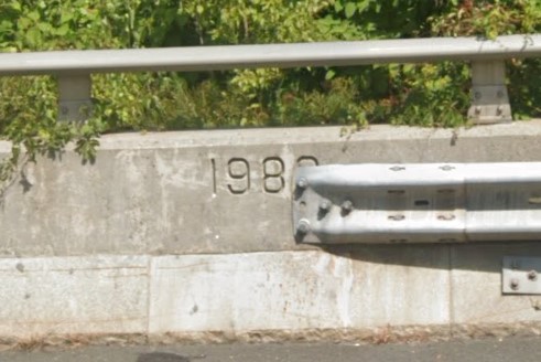 Year stenciled into barrier