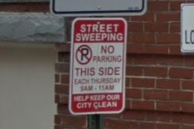 MD street sweeping sign