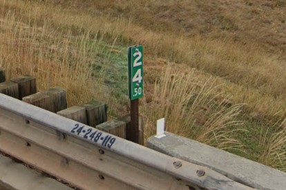Mile marker on bridge